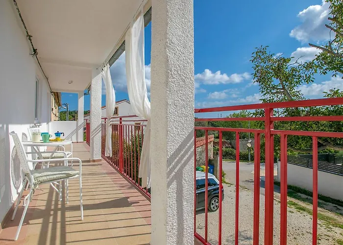 John Βίλα Πούλα